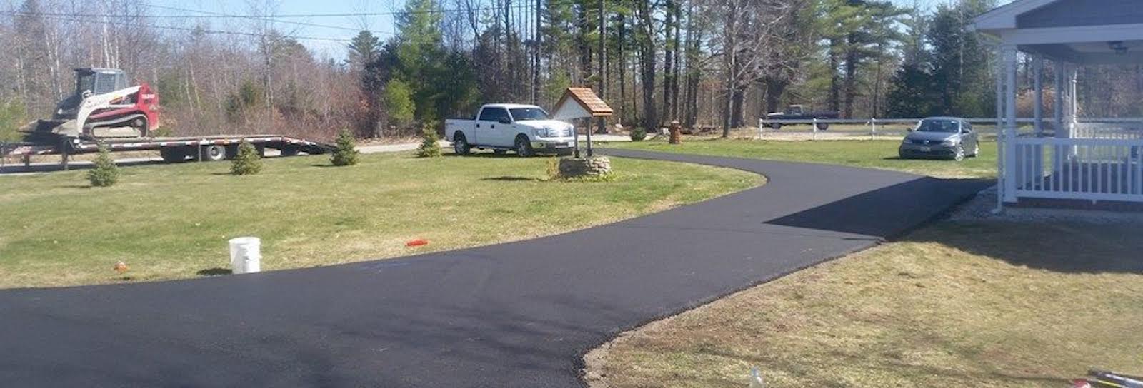 Freshly paved asphalt driveway in Maine