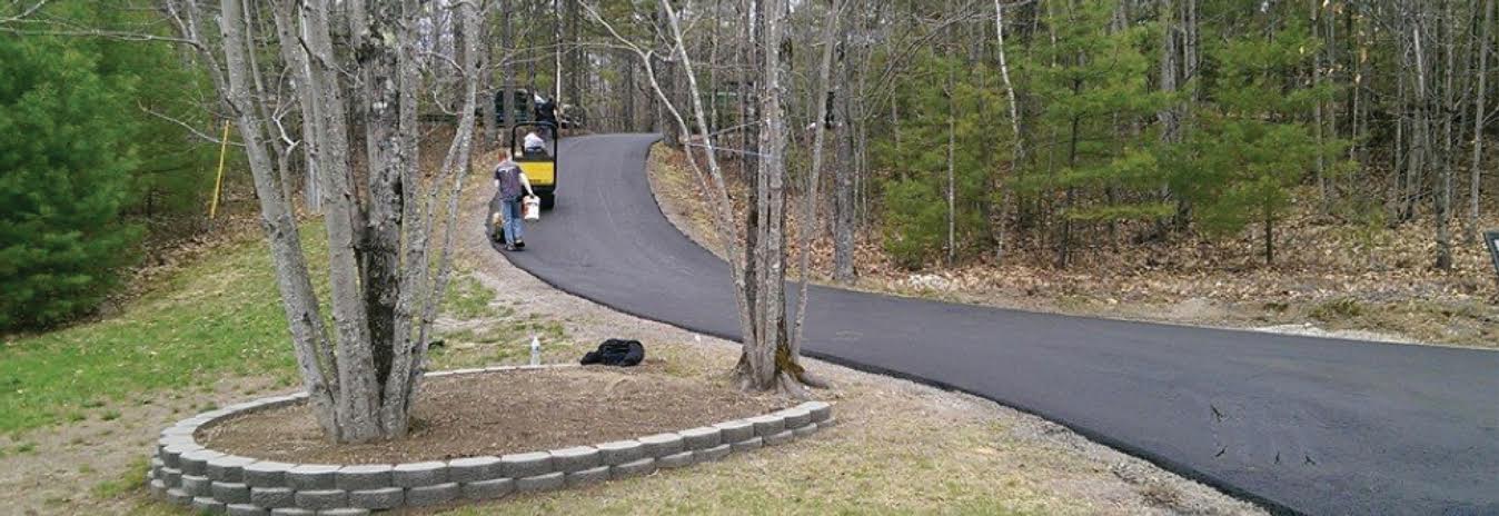 Winding asphalt driveway paved by D&R Paving